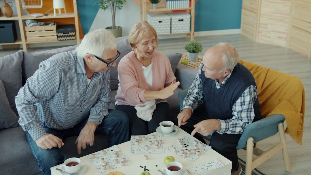 seniors chatting in community room