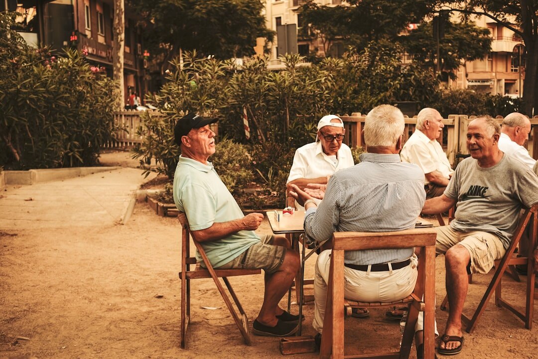 group of seniors playing cards